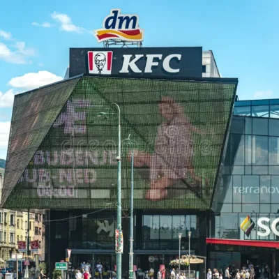 first-kfc-restaurant-sign-top-scc-building-sarajevo-first-kfc-restaurant-sign-top-scc-building-261579022